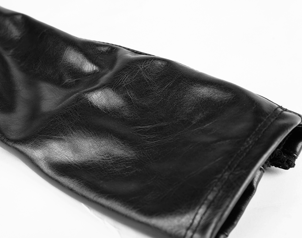 Close-up of black punk gauntlet glove showcasing glossy PU leather texture and sleek design.