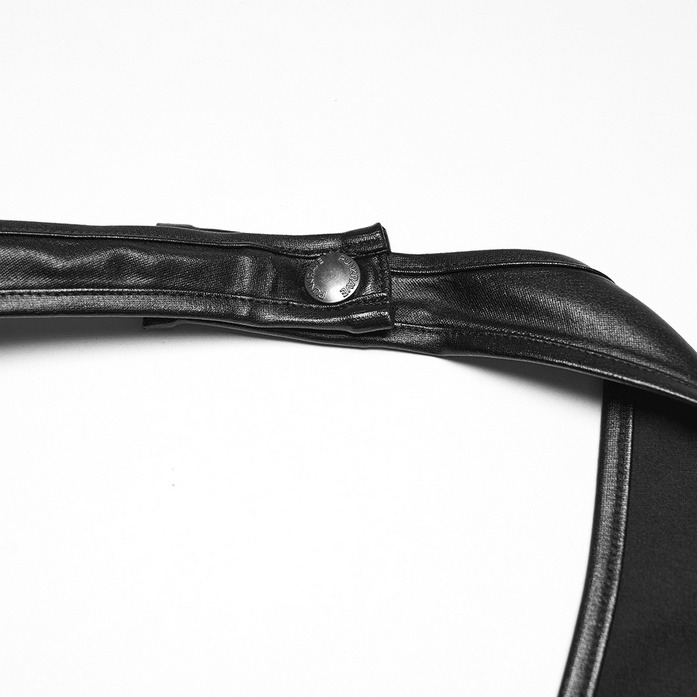 Alt Tag: Black Punk Halter Vest with Studded Strap Panels close-up of black halter strap with metal snap button and sleek faux-leather trim