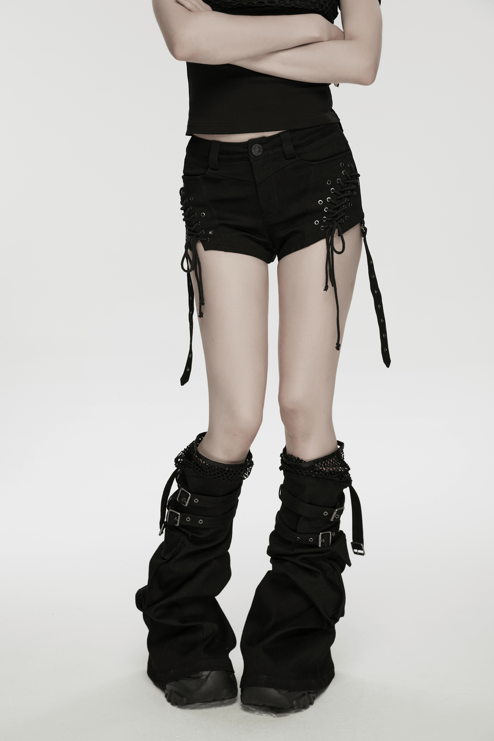 Black Punk Lace Up Shorts and Detachable Flared Pants displayed with stylish knee-high footwear.