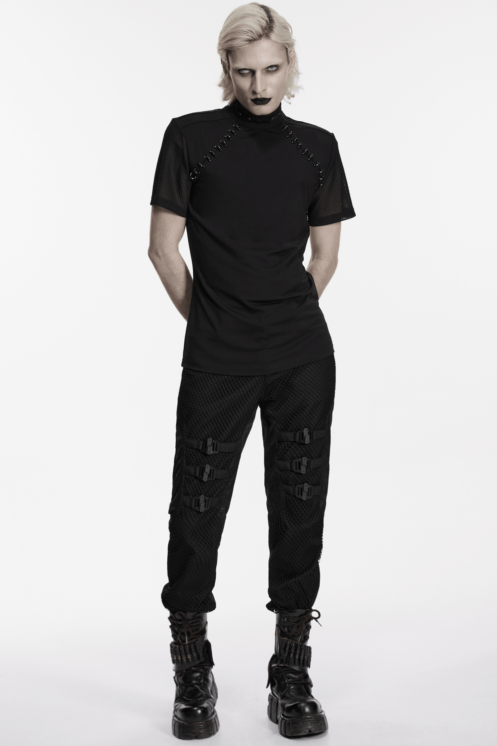 Black Punk Mesh Buckle Pants with Textured Front worn by a model, showcasing a gothic streetwear style.