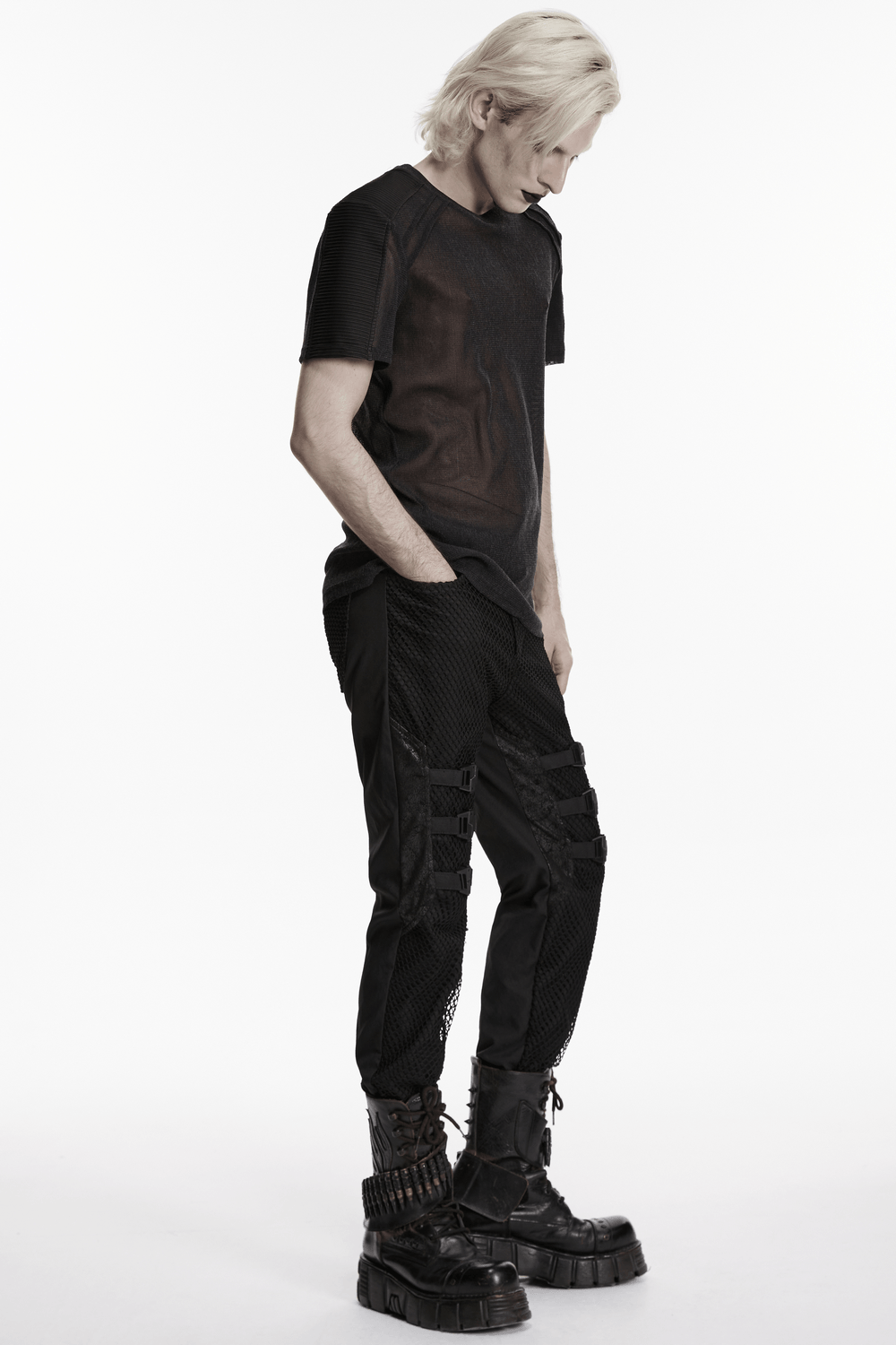 Black Punk Mesh Buckle Pants with Textured Front worn by a model, showcasing a punk minimalist style.