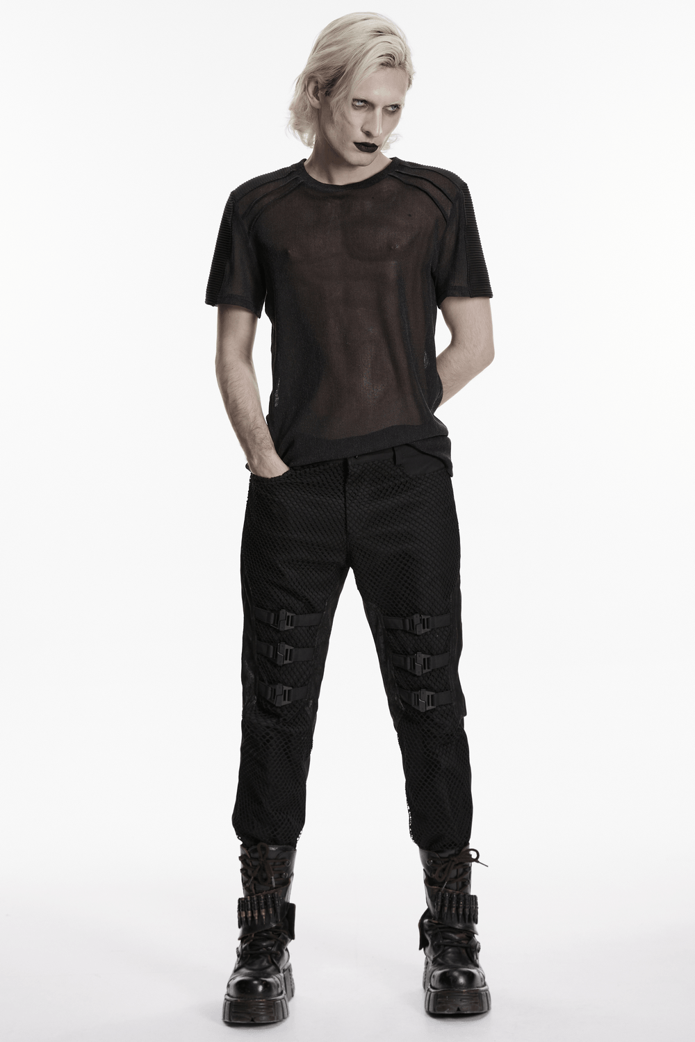 Model wearing Black Punk Mesh Buckle Pants with Textured Front and a sheer black top.