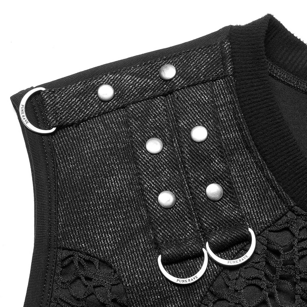 Close-up of black punk tank top showcasing leather accents and stylish snaps for an edgy look.