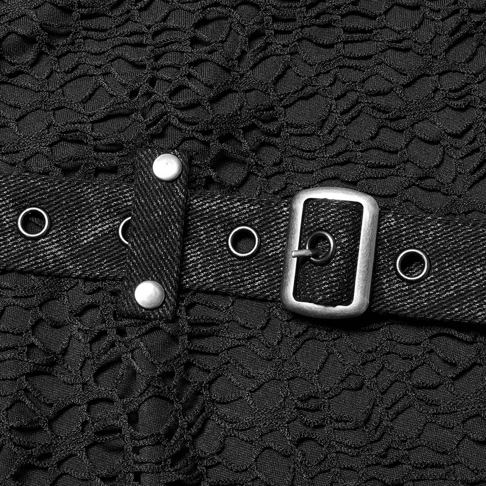 Close-up of a black mesh fabric with leather accents and silver buckle details for a punk fashion look.