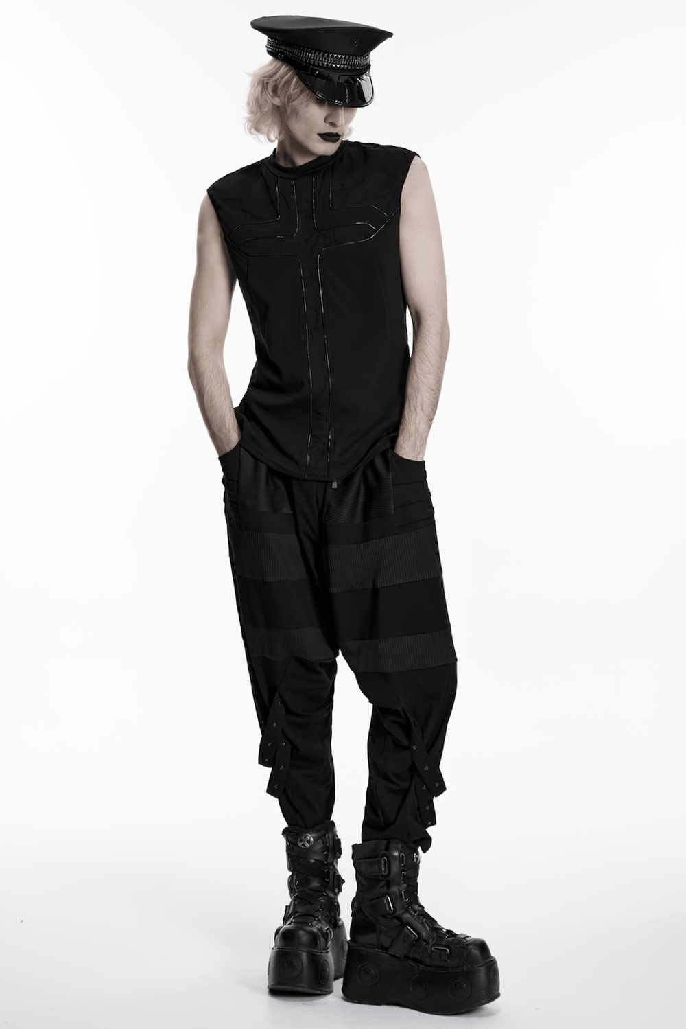Black Punk Military Cap with Studded Gloss Visor worn with a stylish black outfit and edgy footwear.