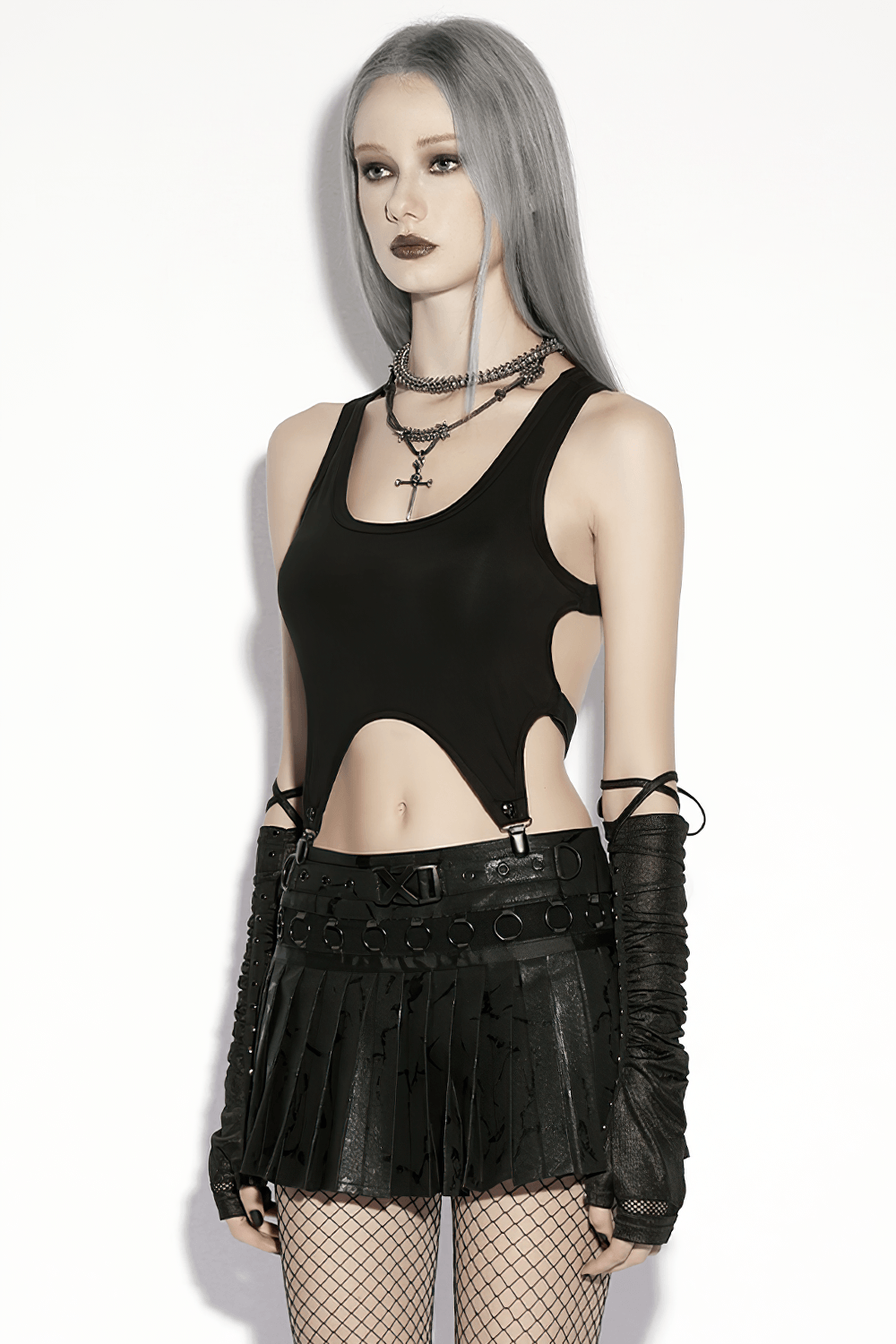 Black Punk Pleated Mini Skirt with Ring Details, styled with a black top and accessories for an edgy outfit.