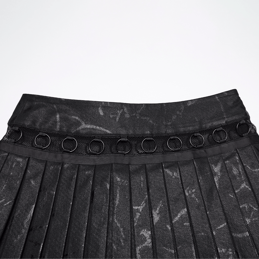Black Punk Pleated Mini Skirt with Ring Details showing pleated design and metal ring webbing.
