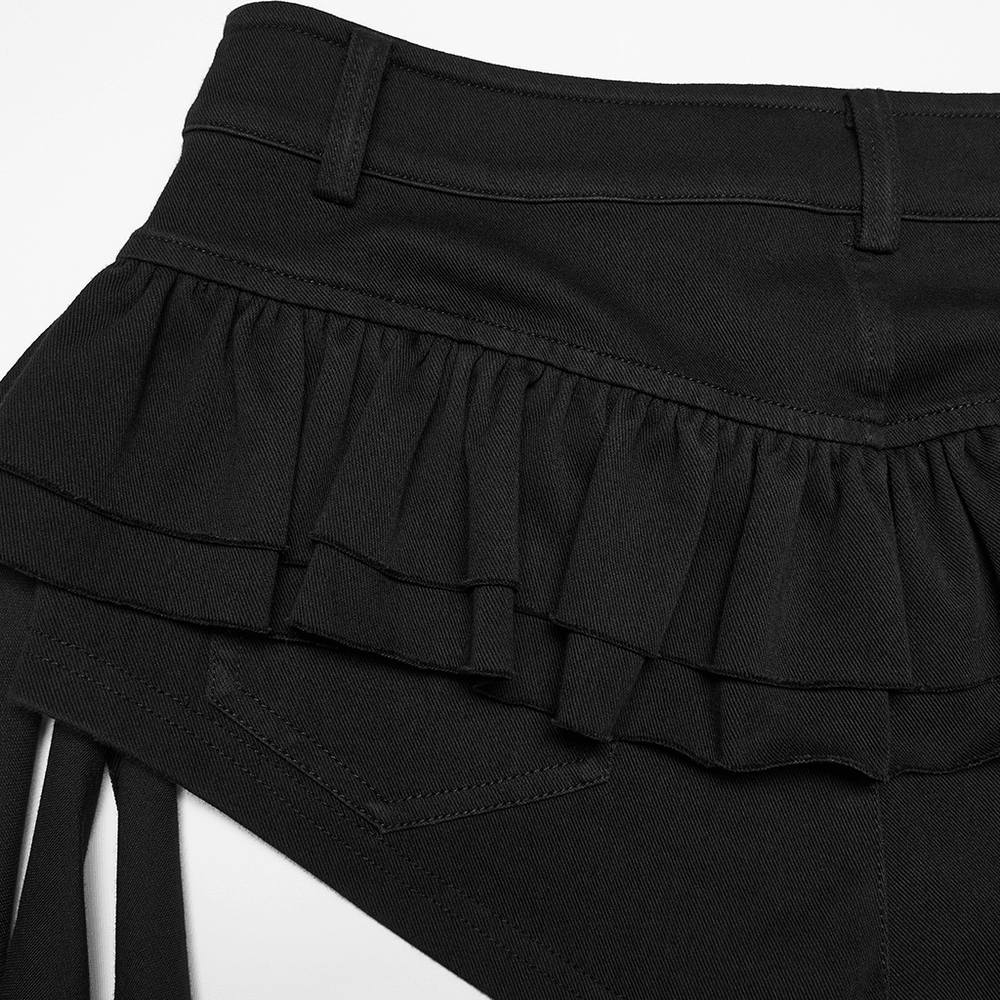 Black Punk Ruffle Buckle Skort with Strap Details showcasing ruffled edges and fitted waistband design.
