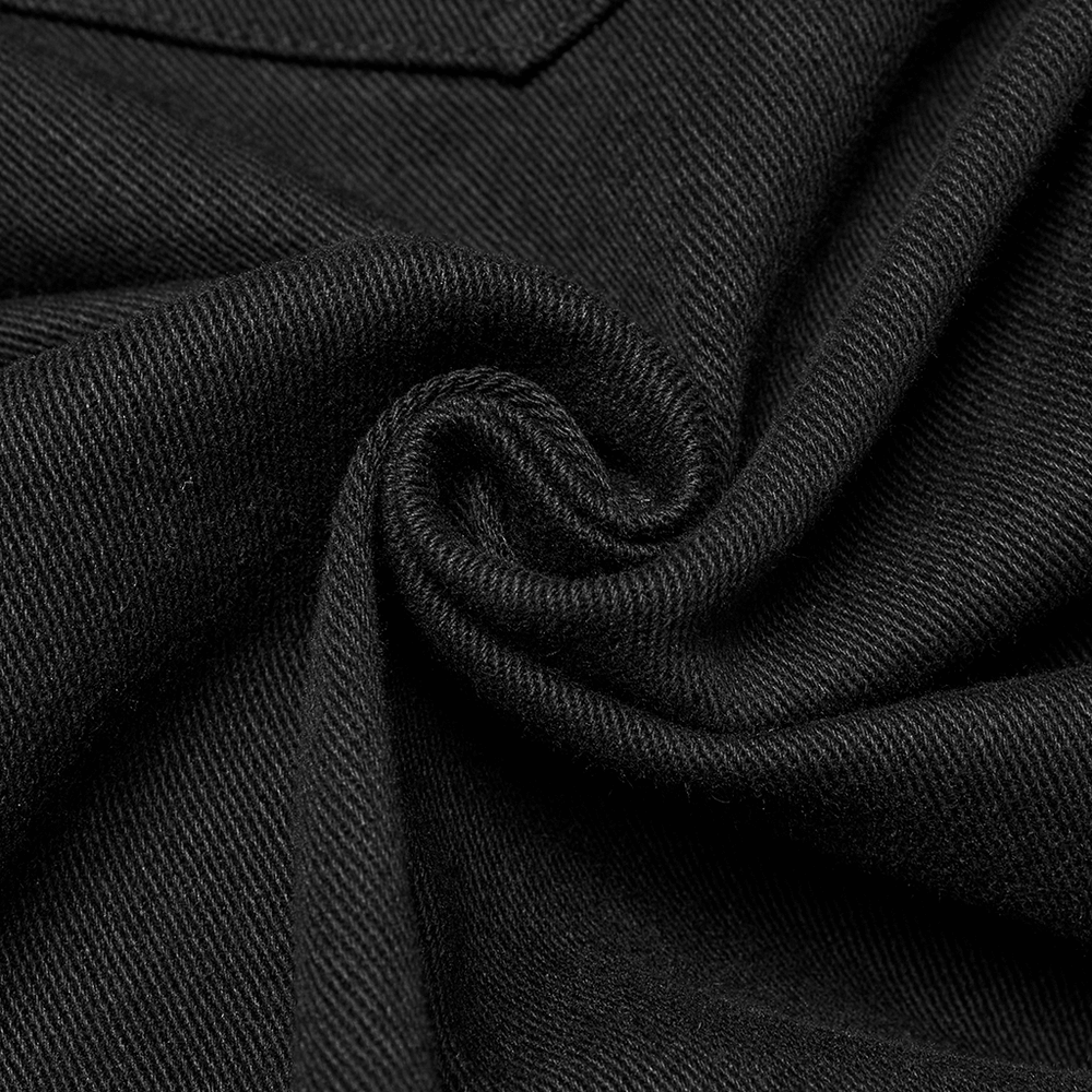 Close-up of black micro elastic twill fabric, showcasing its soft texture and durable weave.
