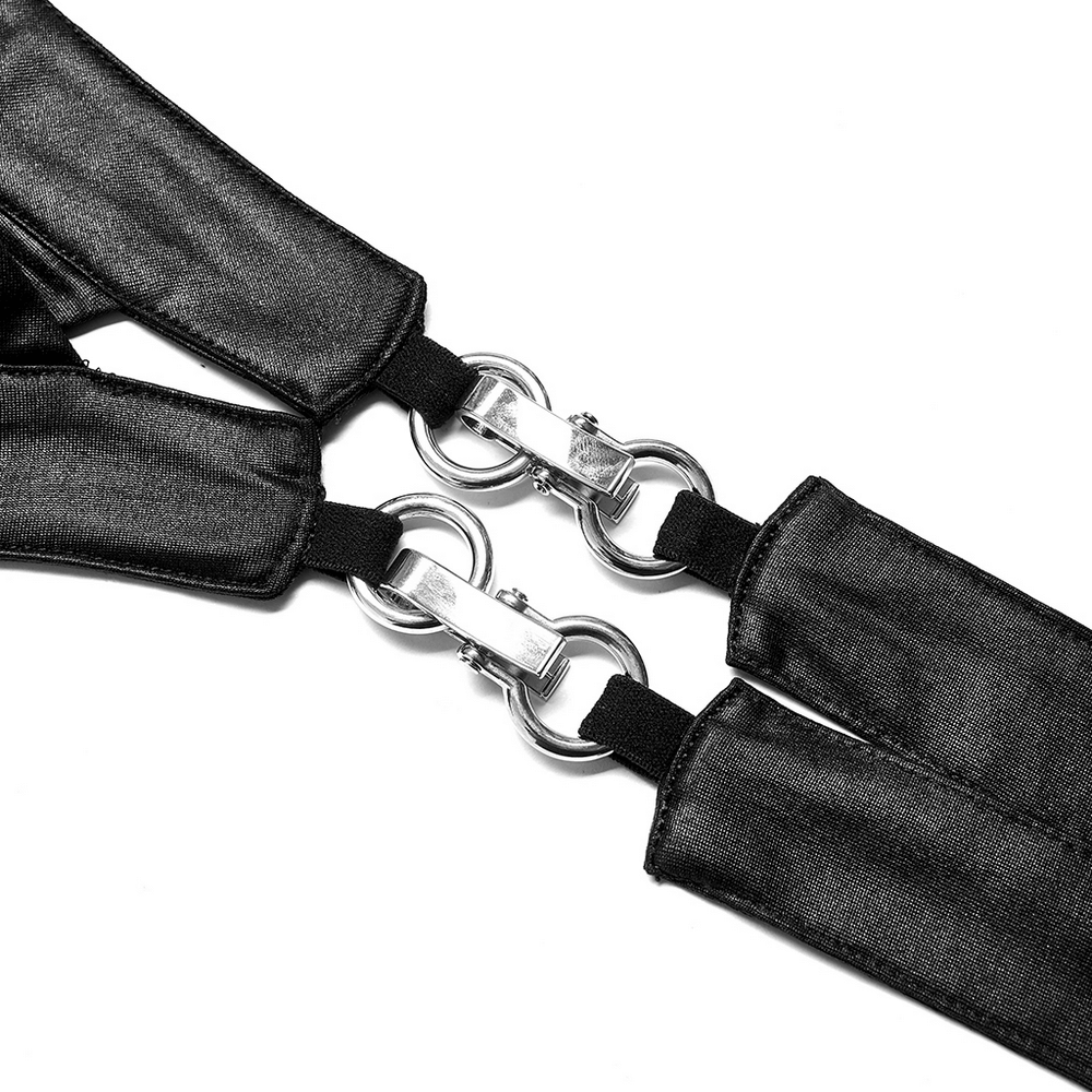 Close-up of black crop top straps with silver metal rings, showcasing punk style and adjustable fit.