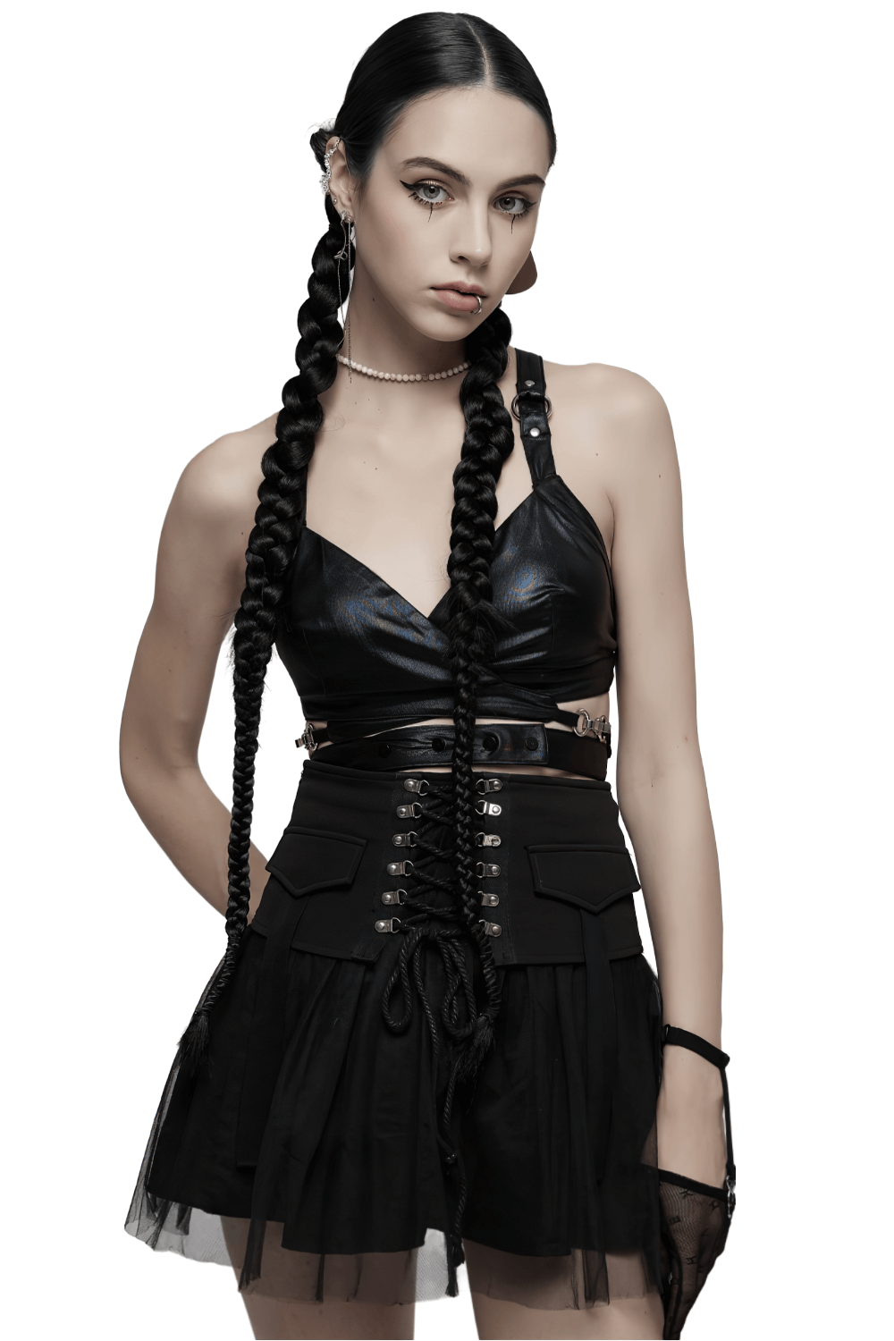 Black punk crop top with crisscross back, paired with layered skirt, perfect for edgy outfits.