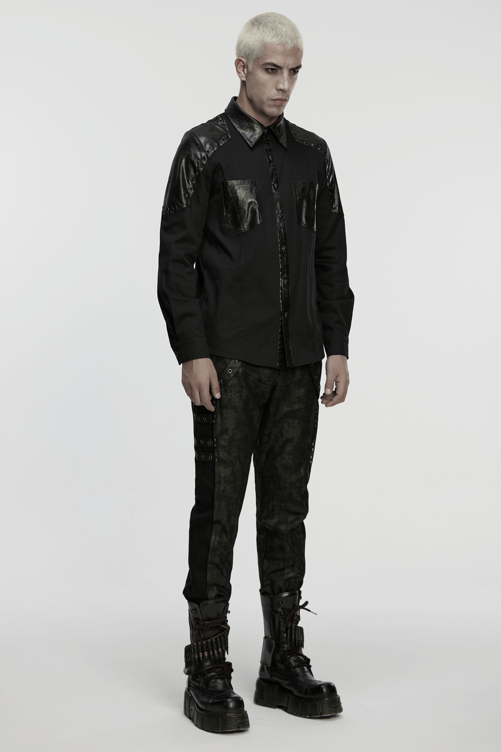 Black Punk Twill Shirt with Leather Panels and Stud Details worn by model, featuring armored shoulders and eyelets.