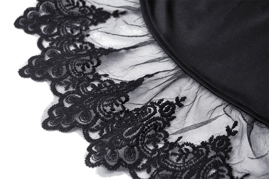 Close-up of intricate black lace detailing on a gothic dress, showcasing elegance and dark romance.