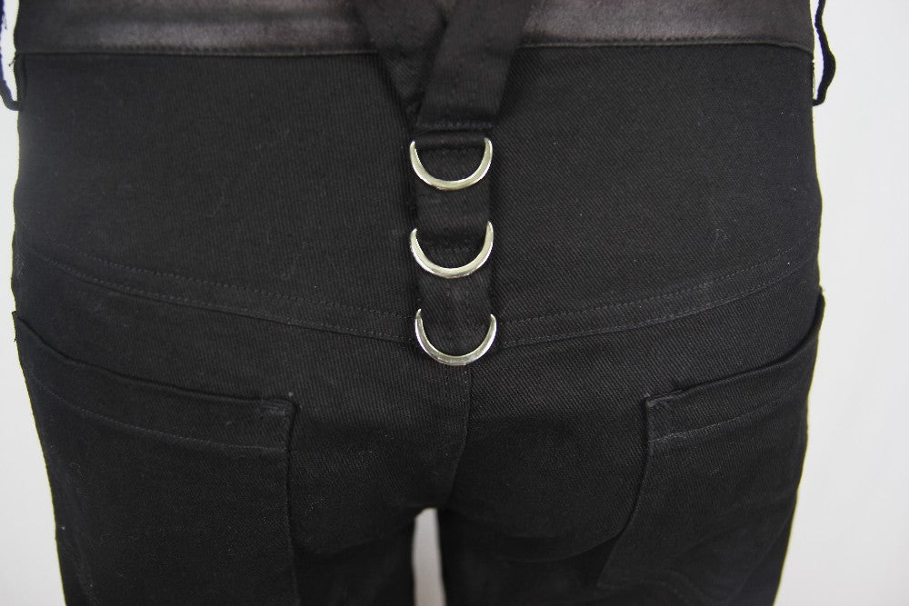 Back view of black rock style shorts featuring straps and rings, perfect for gothic outfits and everyday wear.