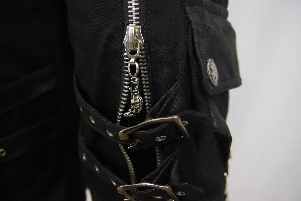 Close-up of black rock style shorts featuring unique zippers and straps, perfect for gothic and alternative fashion.