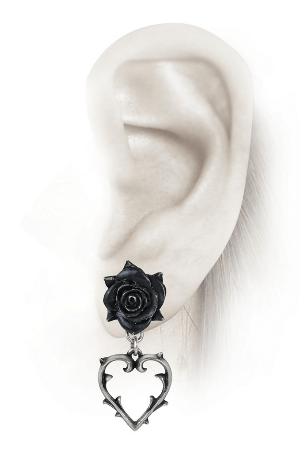 Black rose and pewter heart earrings showcasing gothic charm on a model's ear.