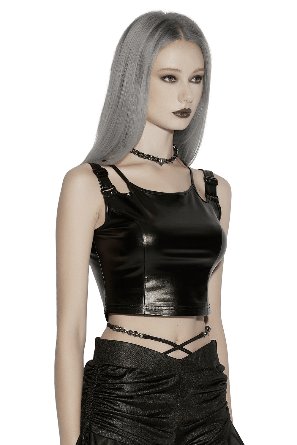 Black Rubberized Punk Techwear Crop Top Women modeled by a model with silver hair, showcasing adjustable buckles and sleek design.