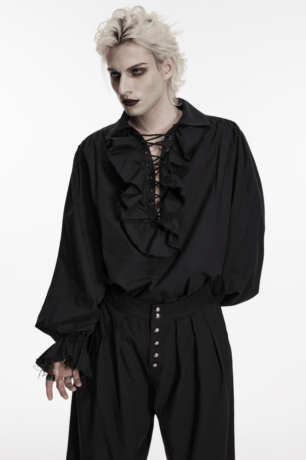 Man wearing a Black Ruffle Lace Up Gothic Poet Shirt for Men with bubble sleeves and ruffles.