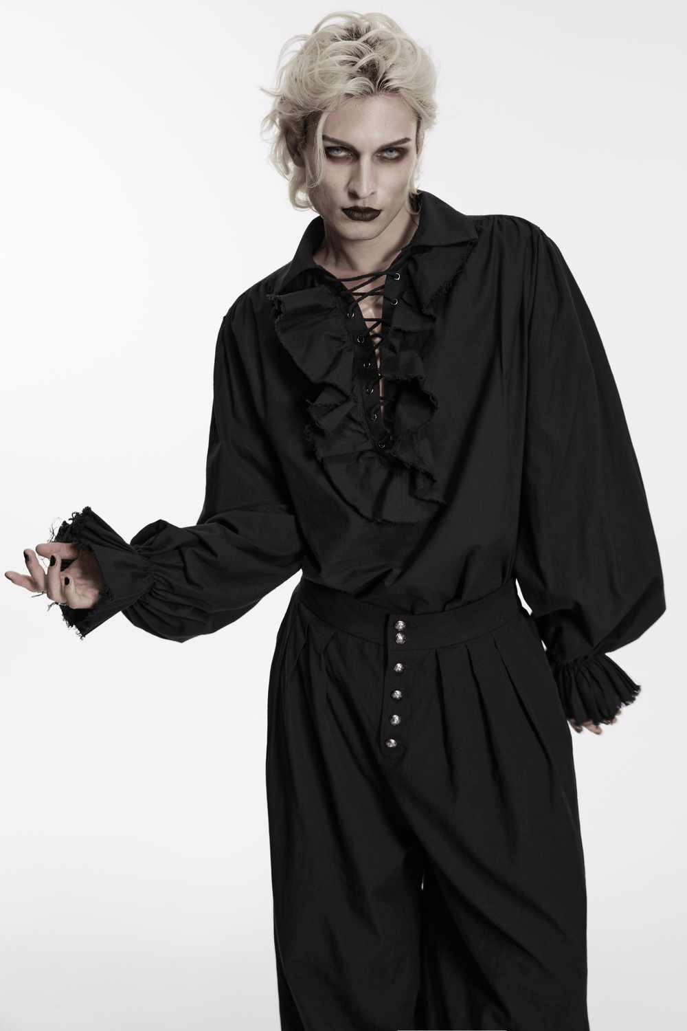 Black Ruffle Lace Up Gothic Poet Shirt for Men worn by a model with dramatic makeup and styled hair.