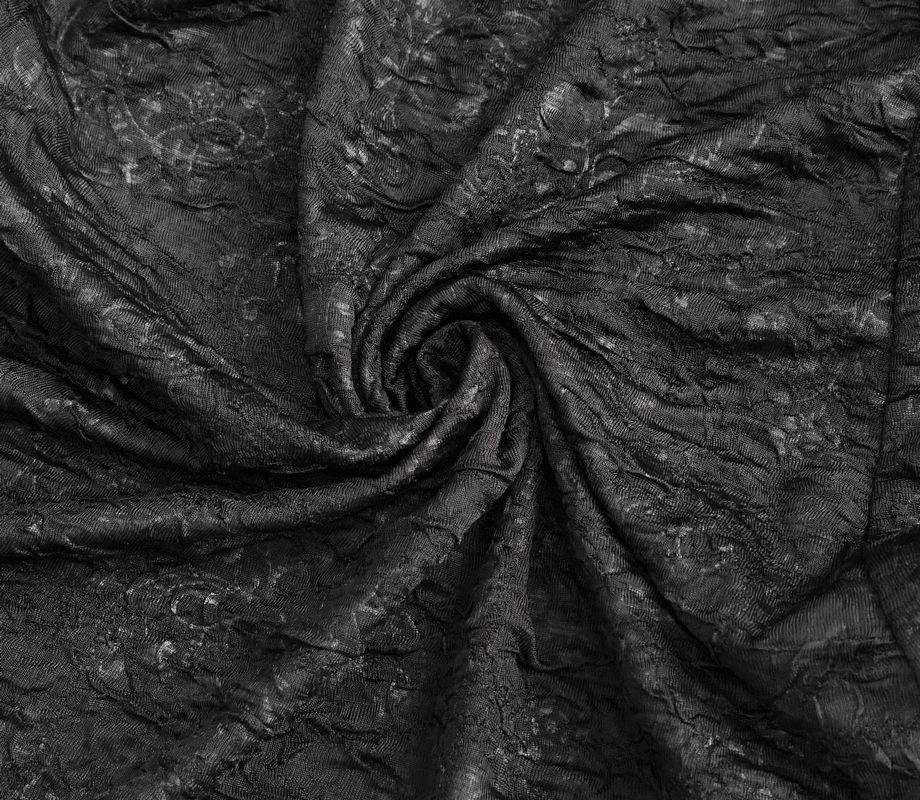 Luxurious black lace fabric, beautifully draped, perfect for elegant gothic dresses and stylish fashion designs.