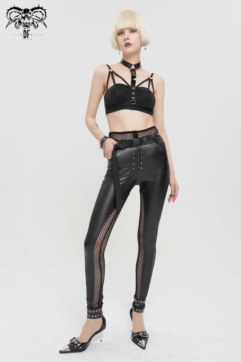 Gothic punk style model wearing black sexy bra with faux leather neck strap and skin-tight black pants.