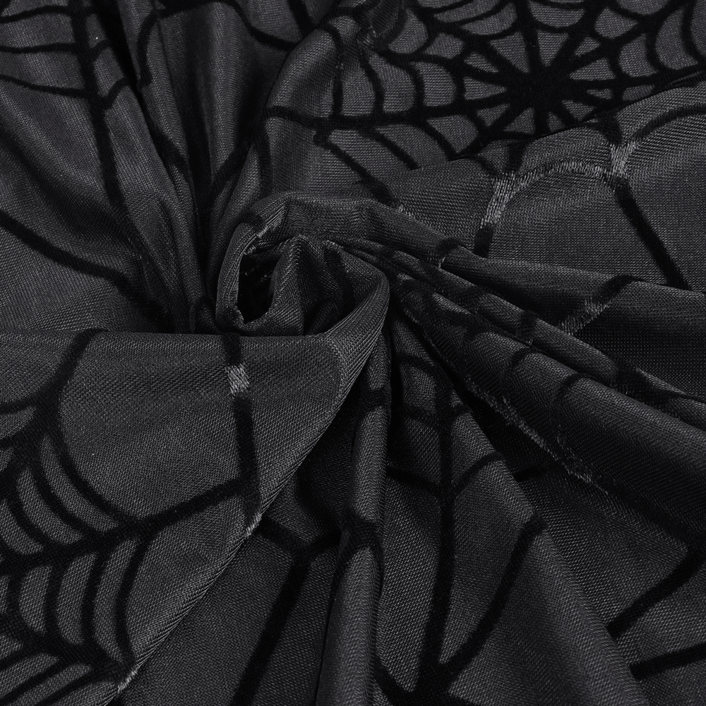 Close-up of black sheer fabric with intricate spiderweb pattern, perfect for gothic-inspired fashion.