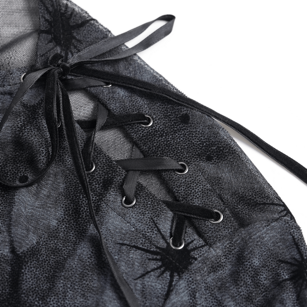 Black Sheer Gothic Mesh Top with Buckle Sleeve Straps lace-up detail close-up on smoky mesh fabric.
