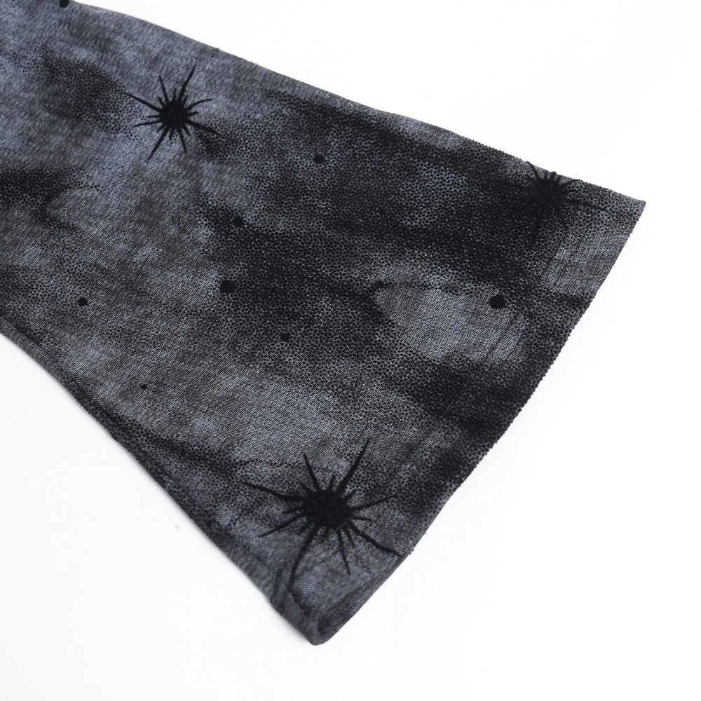 Black Sheer Gothic Mesh Top with Buckle Sleeve Straps close-up of smoky mesh sleeve with scattered starburst accents.