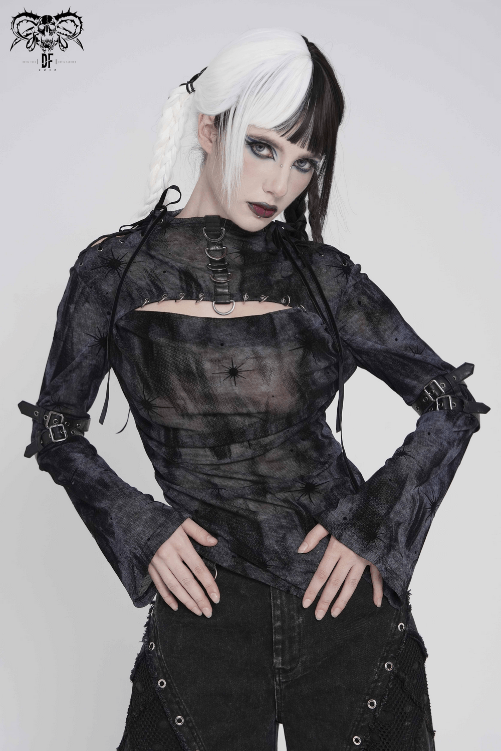 Black Sheer Gothic Mesh Top with Buckle Sleeve Straps worn by model, showcasing its dark style and accents.