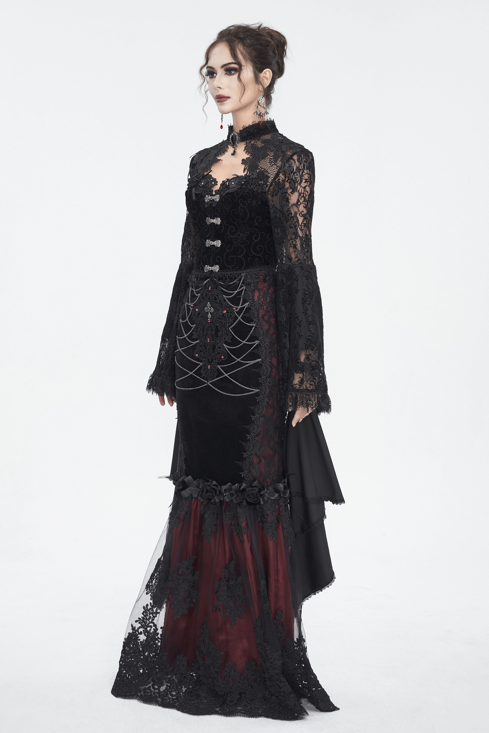 Elegant black velvet dress with lace details and dramatic bell sleeves, perfect for gothic romantic style.
