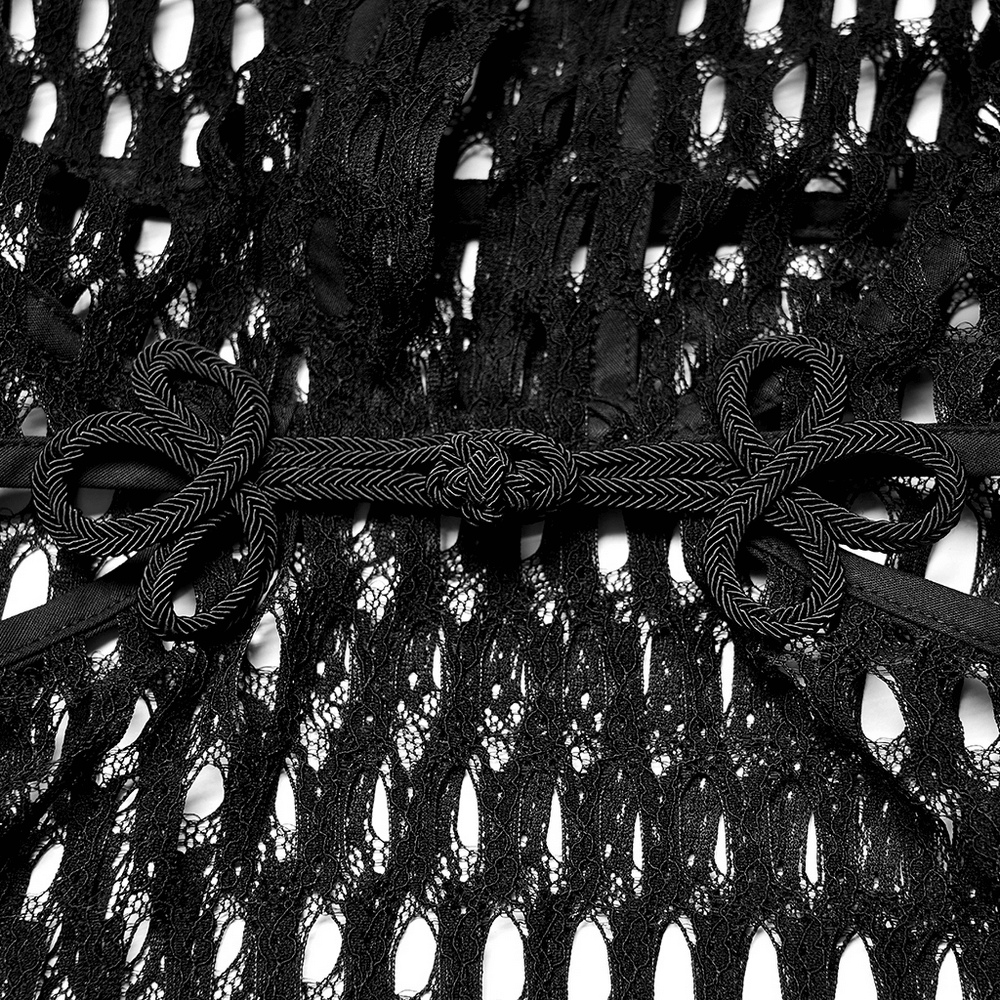 Close-up of black sheer mesh fabric with intricate knot closure detail of punk-inspired crop top hoodie.
