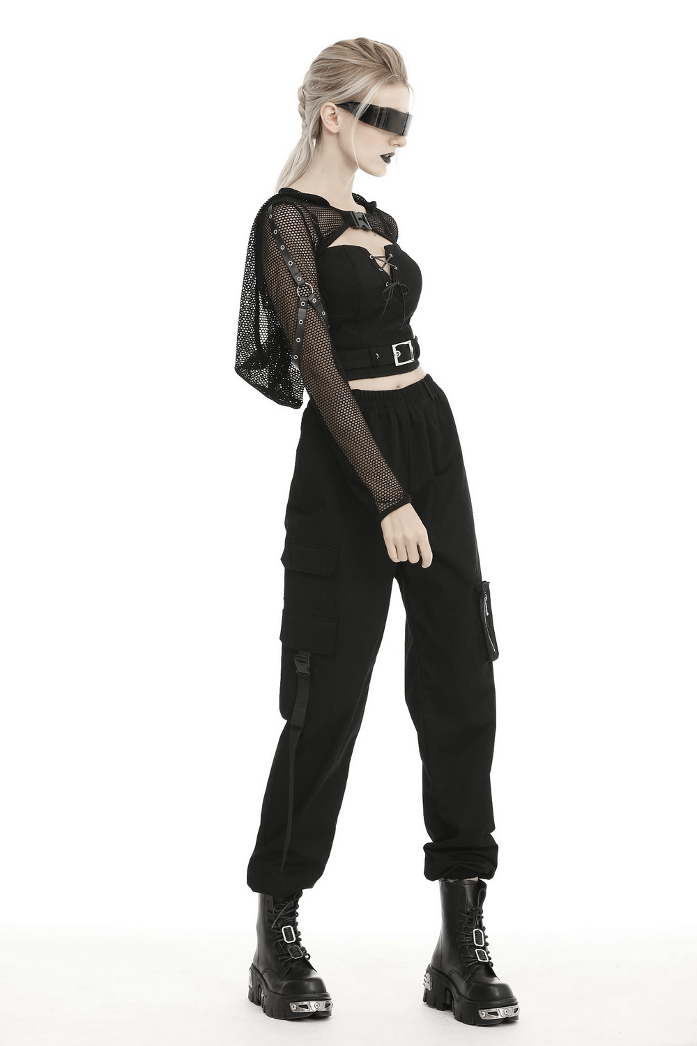 Model wearing a black sheer mesh hooded top with long sleeves, styled with cargo pants and chunky boots for a trendy look.