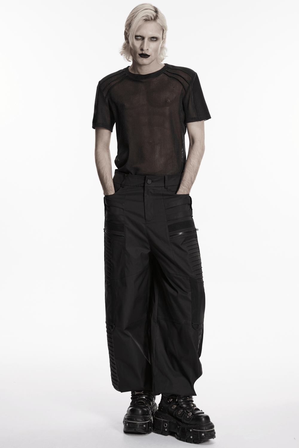 Model wearing Black Sheer Mesh Punk T-shirt with Shoulder Panels and black cargo pants, showcasing a gothic punk style.