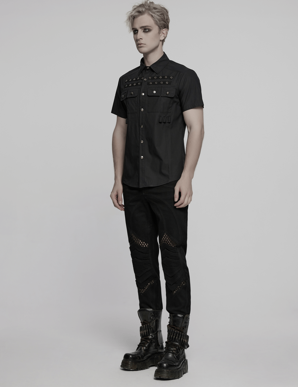 Black short sleeve punk shirt with eyelet detail, styled with edgy accessories for alternative fashion.