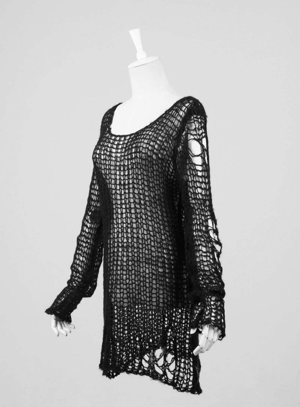 Black shredded knit crocheted sweater with long sleeves, featuring a loose-knit design for a punk rave inspired look.