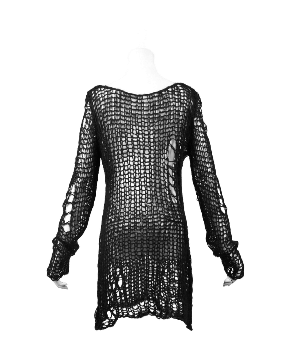 Back view of a black shredded knit crocheted sweater with long sleeves, edgy Punk Rave style perfect for layering.