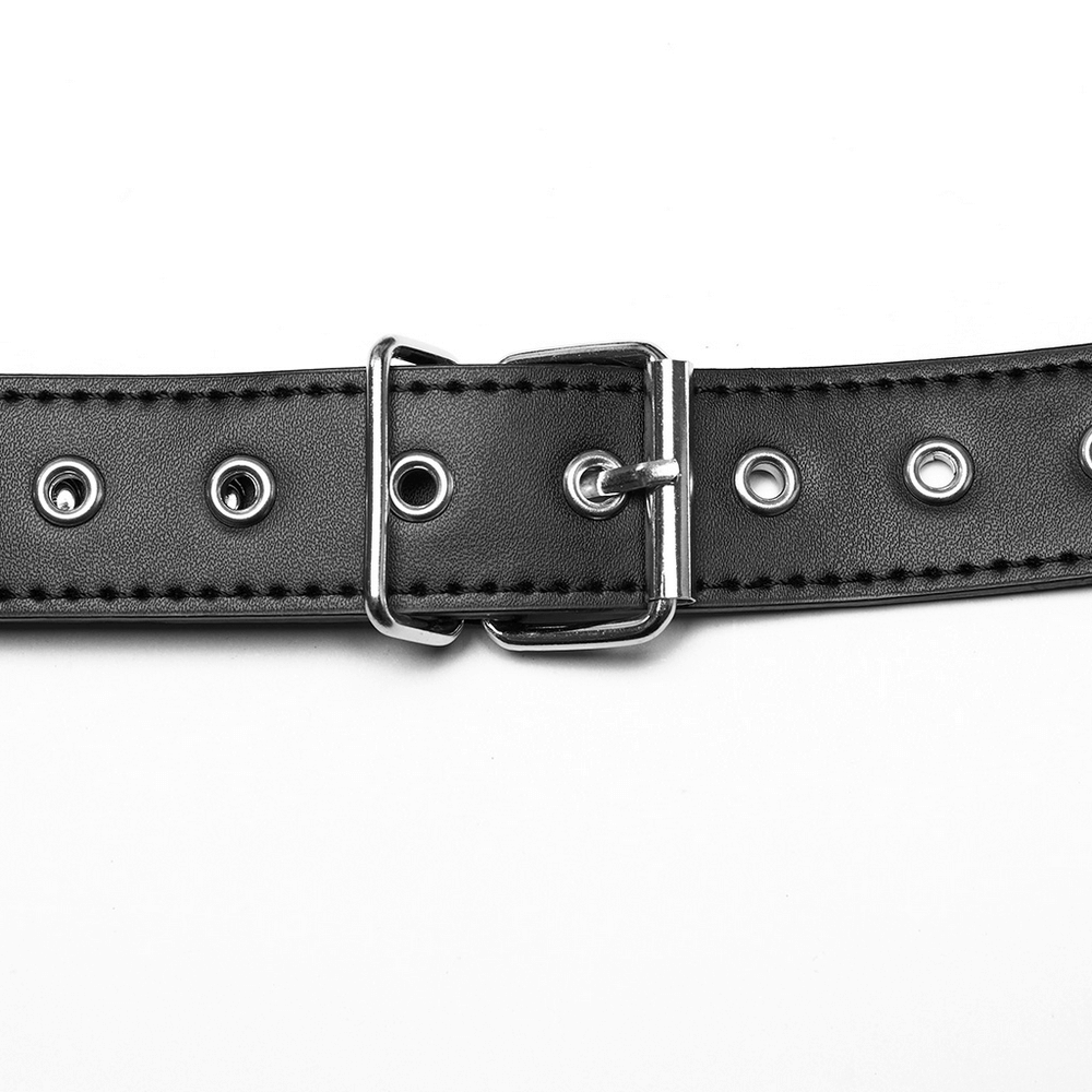 Black synthetic leather belt with metal eyelets and buckle close-up for punk shoulder harness.