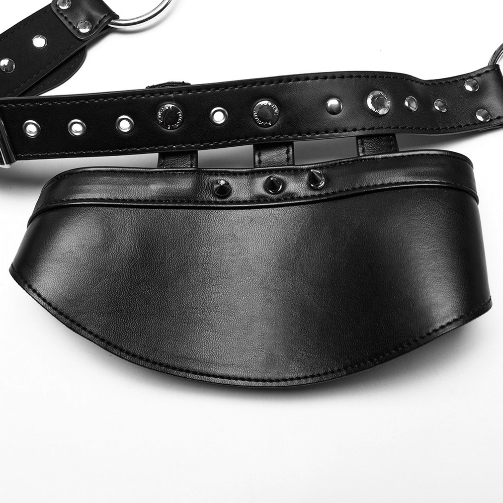 Black synthetic leather punk shoulder harness with studs and adjustable belt straps.