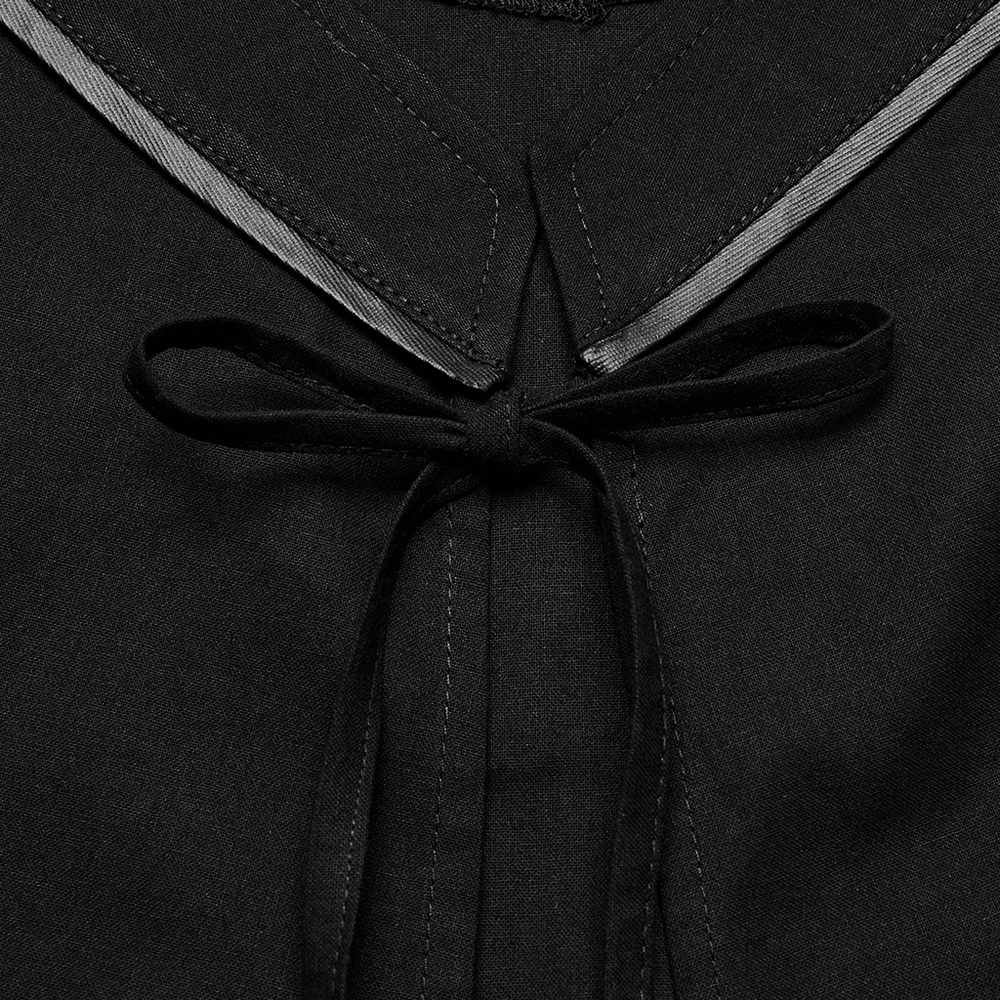 Close-up of the black lace kimono dress collar with a stylish black ribbon tie.