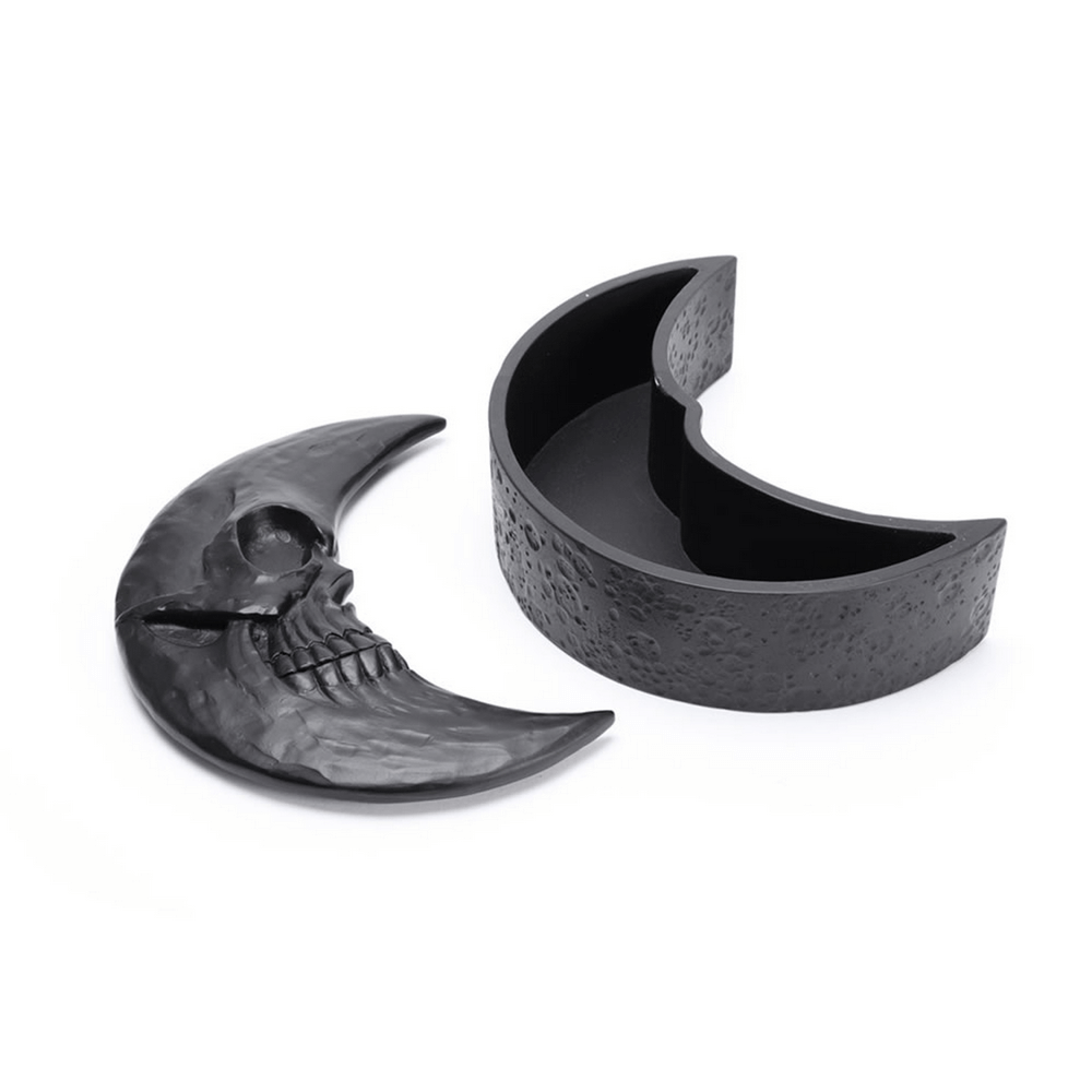 Matte black crescent moon jewelry box with a skull design, perfect for gothic decor and storing trinkets.