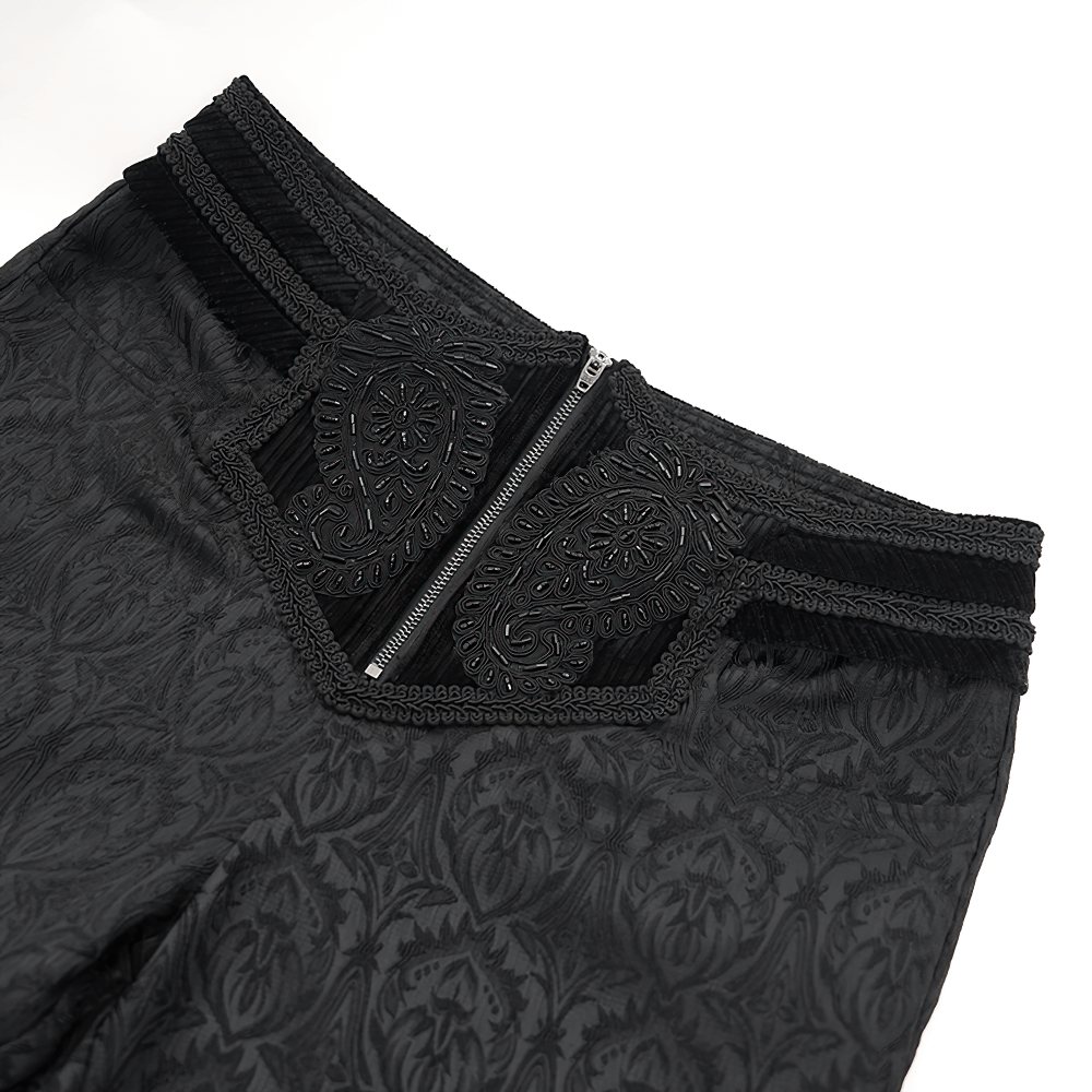 Close-up of black slim-fit embossed pants showcasing intricate detailing and elegant design for stylish autumn wear.