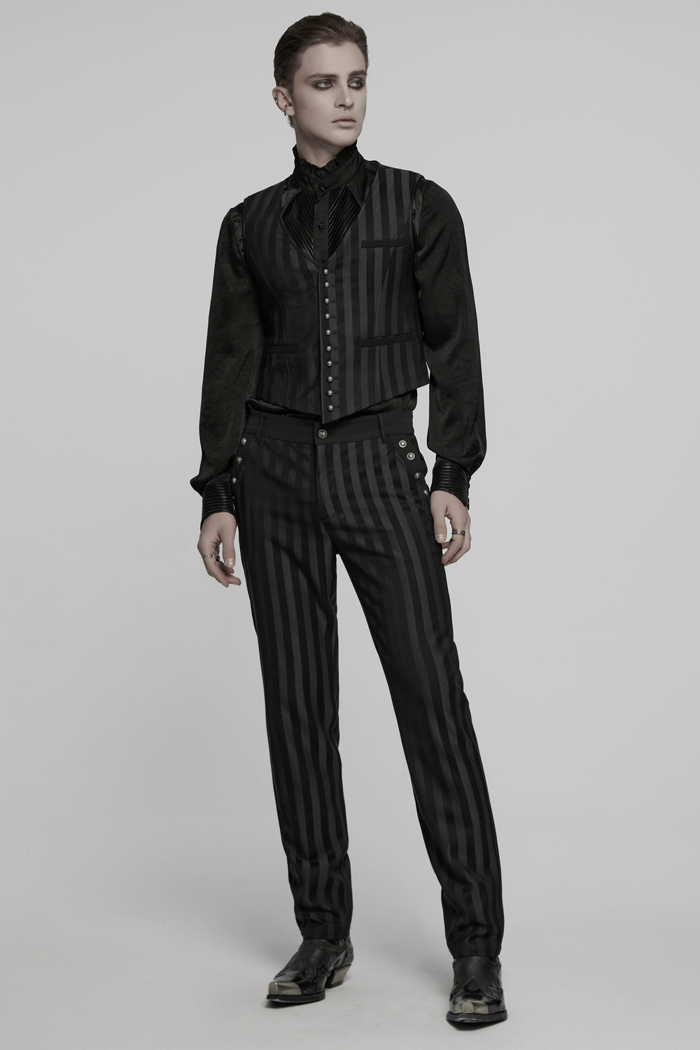 Black slim fit striped gothic trousers for men with buckle details and a sleek silhouette.