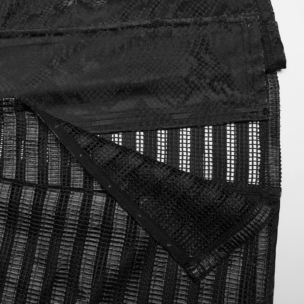 Close-up of black snake print and striped mesh fabric for edgy punk dress design.