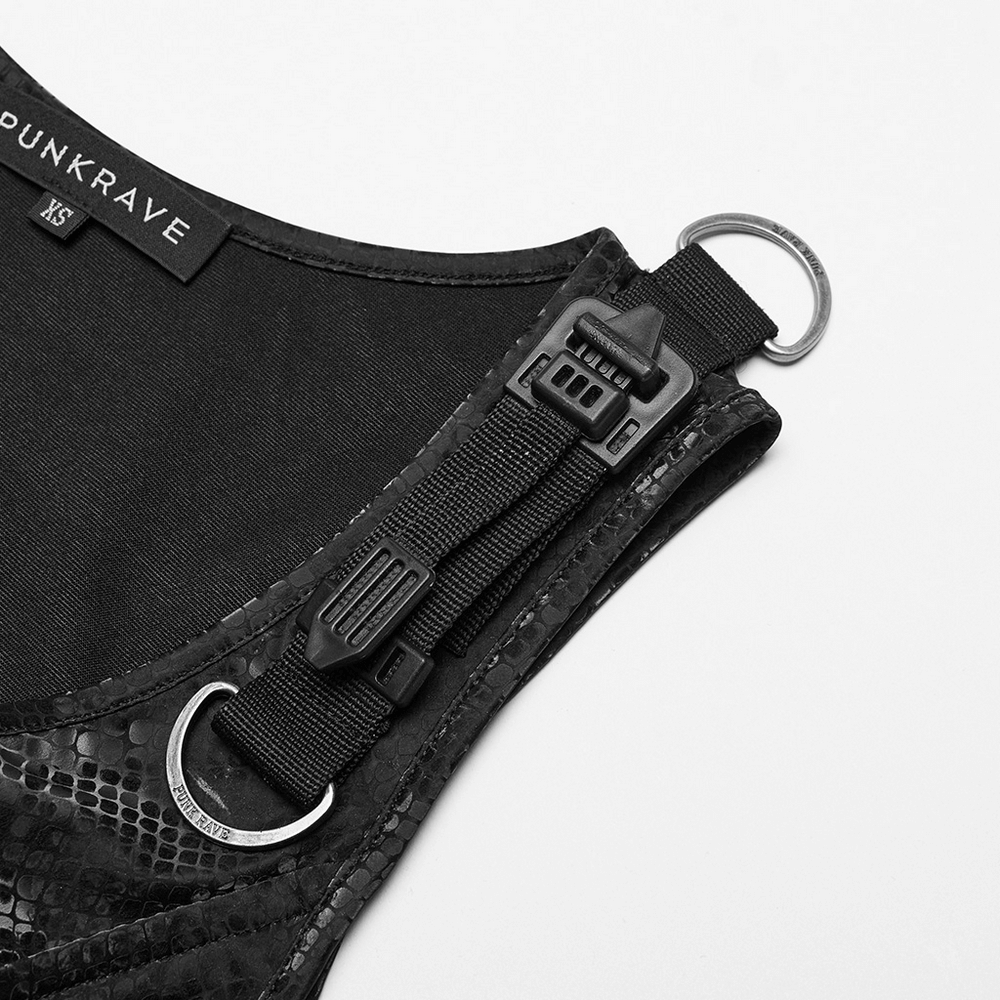 Close-up of black snake print dress strap with punk design and metal accents, showcasing edgy fashion details.
