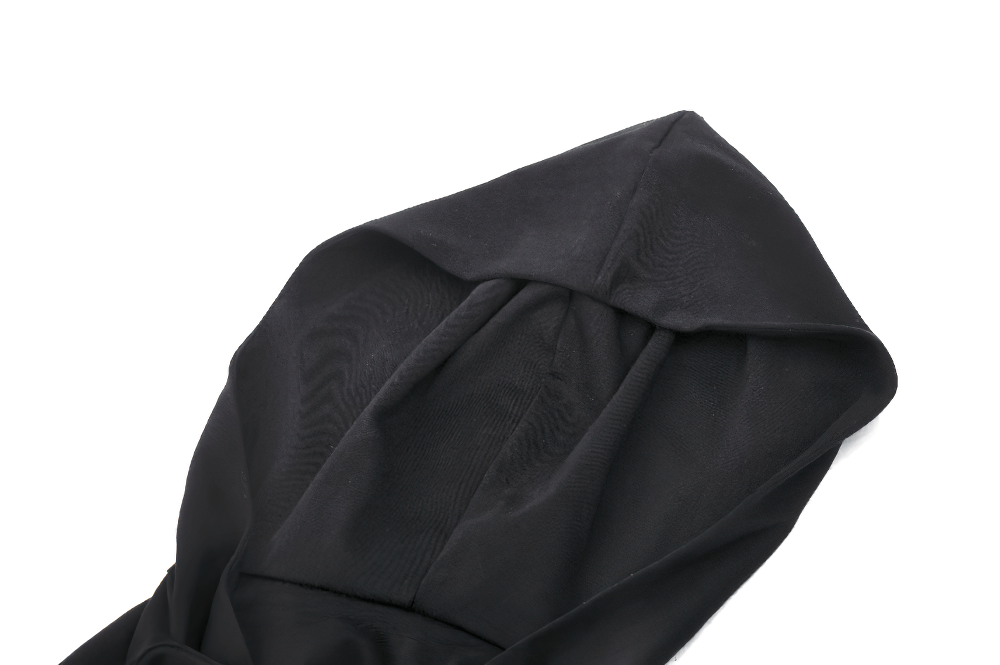 Close-up of the hood from a black strappy crop top featuring edgy design and modern fabric texture.