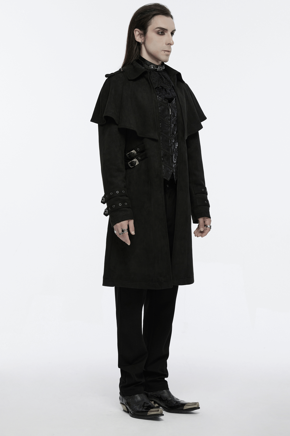 Man in a black suede gothic cape coat with decorative buckles, styled for a unique gothic aesthetic.