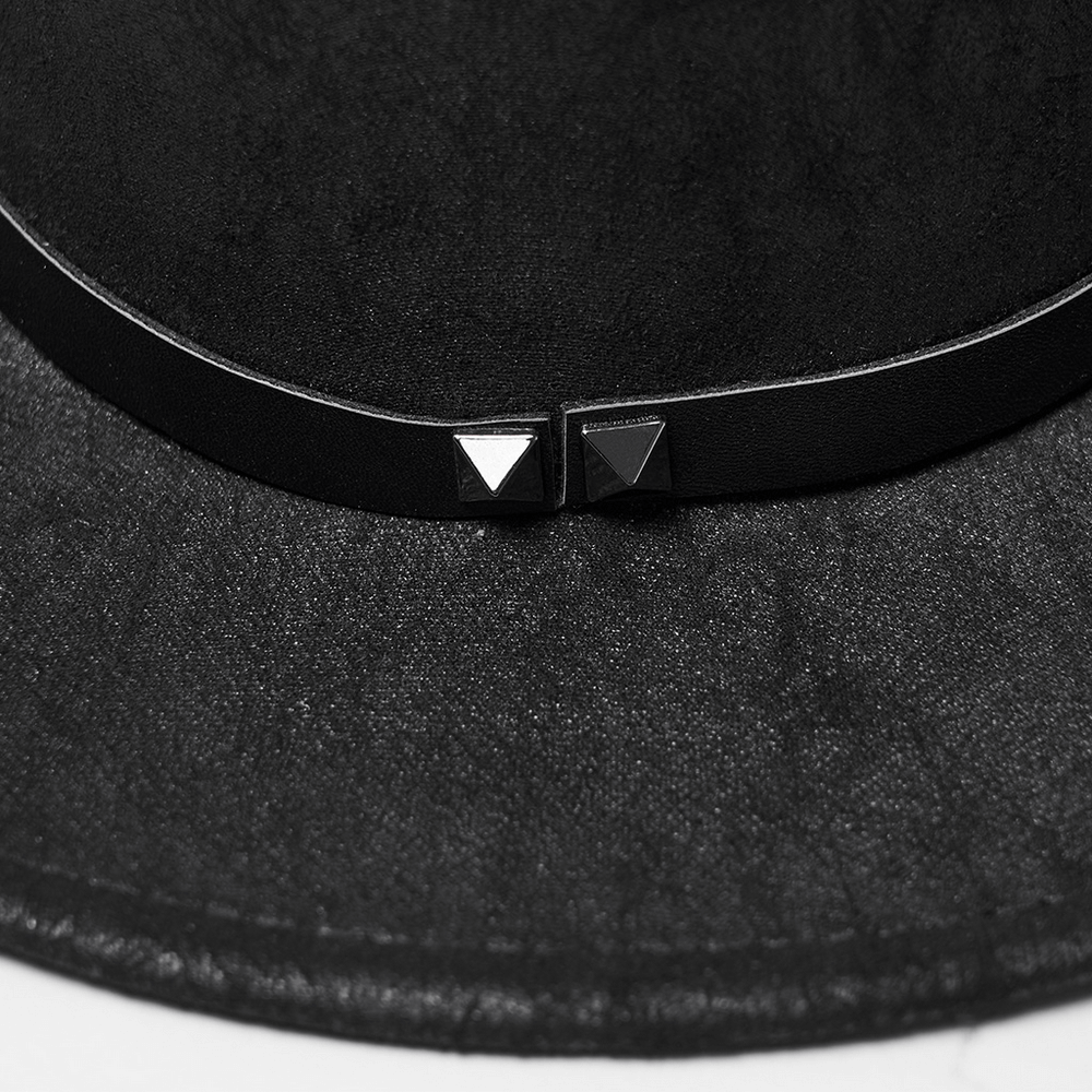 Close-up of black suede steampunk hat with triple buckle straps and rivets for a bold, stylish statement accessory.