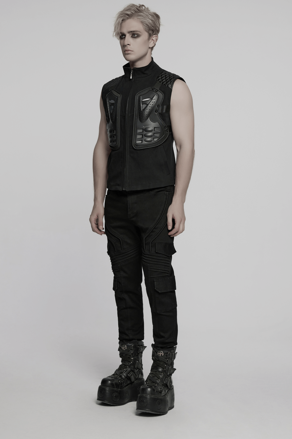 Futuristic black tactical vest with 3D rubber armor panels, perfect for cyberpunk streetwear.