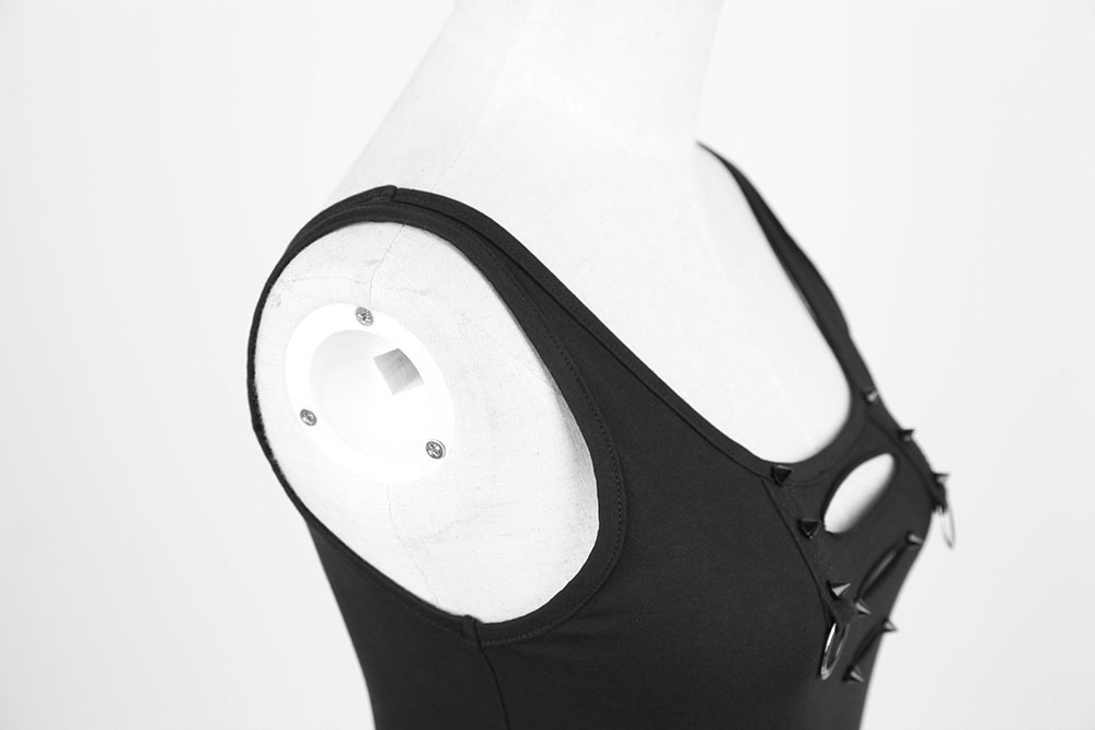 Close-up of edgy black tank top showing unique cutout details and ring embellishments perfect for summer styles.