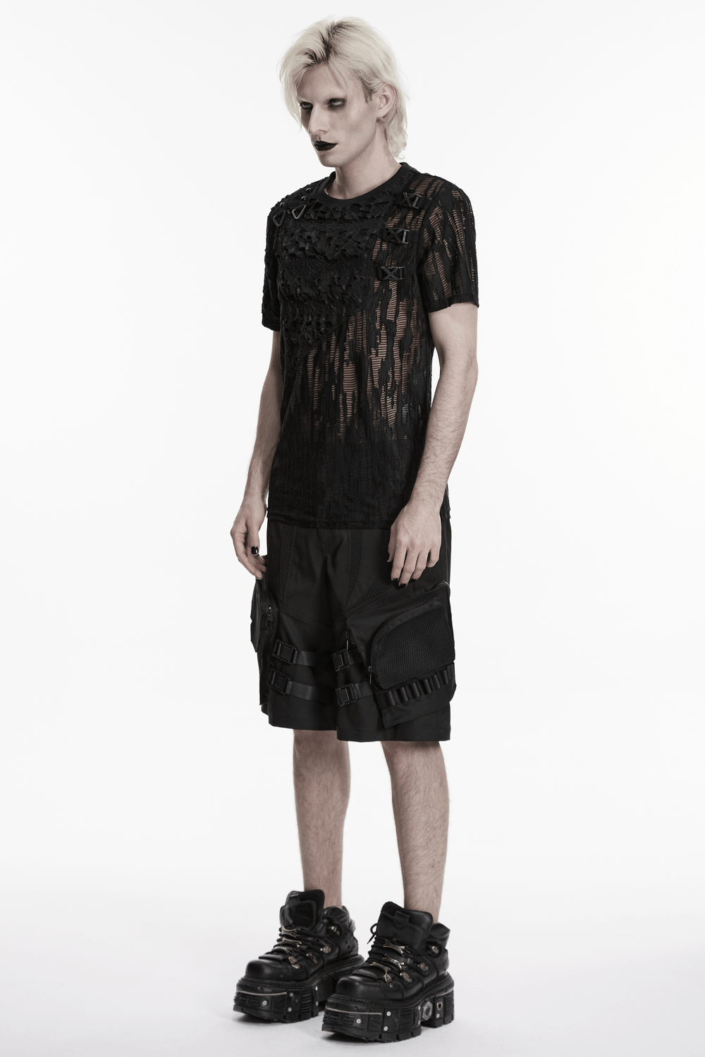 Black Tattered Mesh Punk T-shirt with Shoulder Lacing worn by a model with stylish black shorts and platform boots.